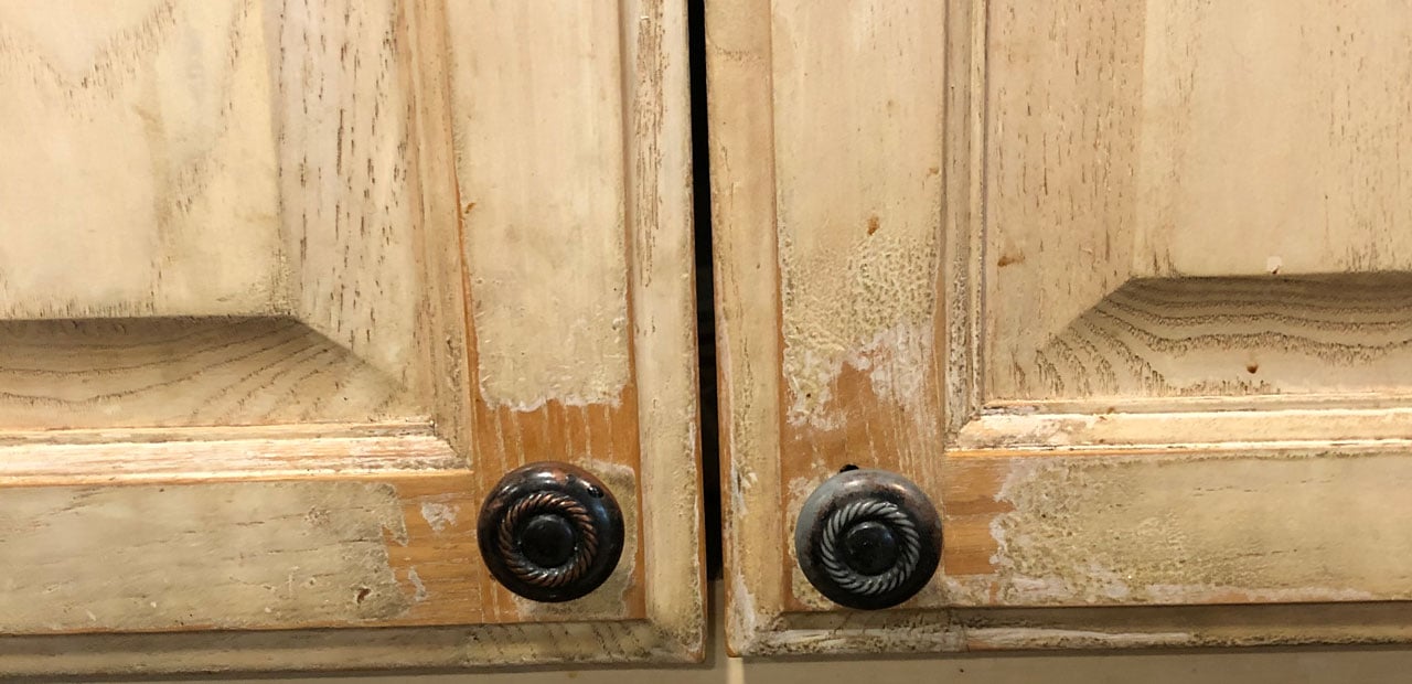 Worn out stained cabinets - white washed